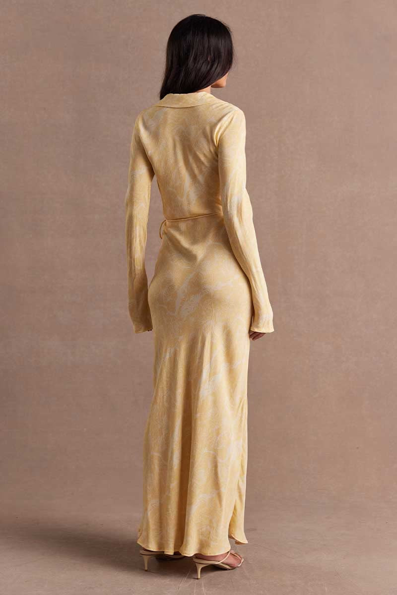 Butter maxi dress back view with long sleeves and waist tie