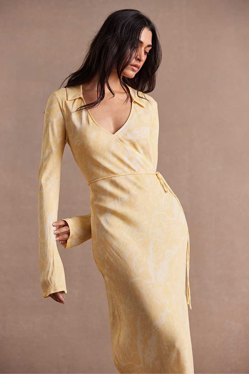 Butter wrap-style maxi dress with V-neck, long sleeves, and waist tie strings
