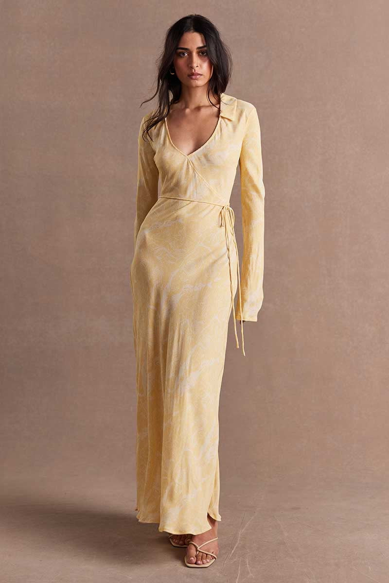 Butter maxi dress with V-neck, long sleeves, and side waist tie detail