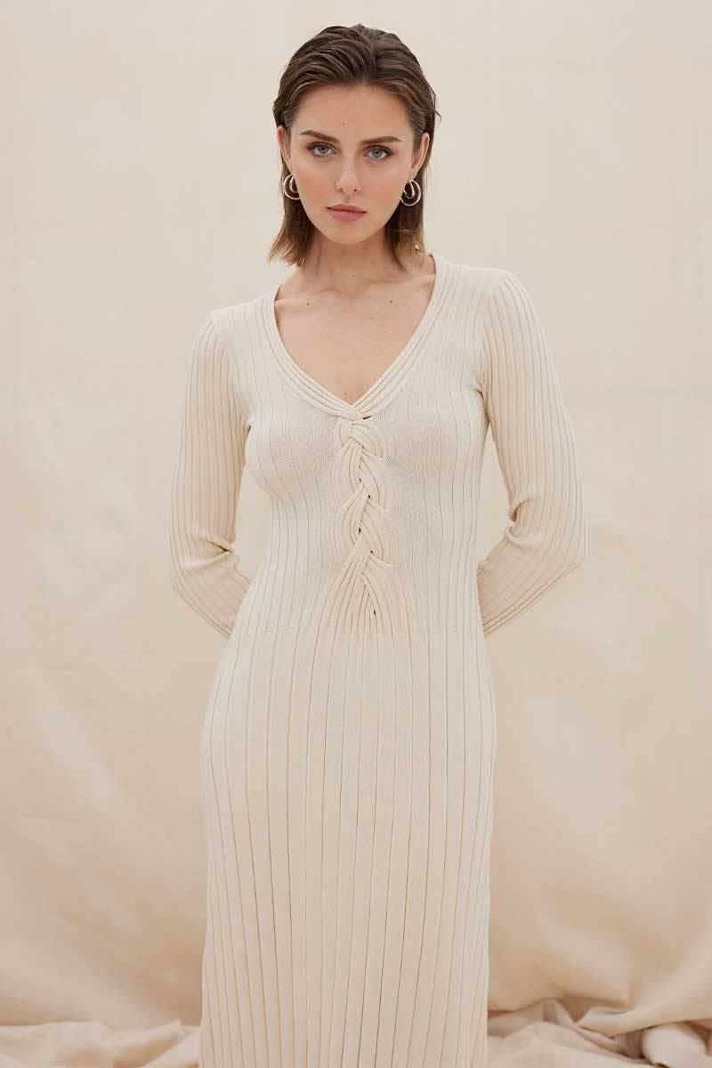 Natural ribbed long-sleeve midi dress with V-neck and lace-up bodice, close-up