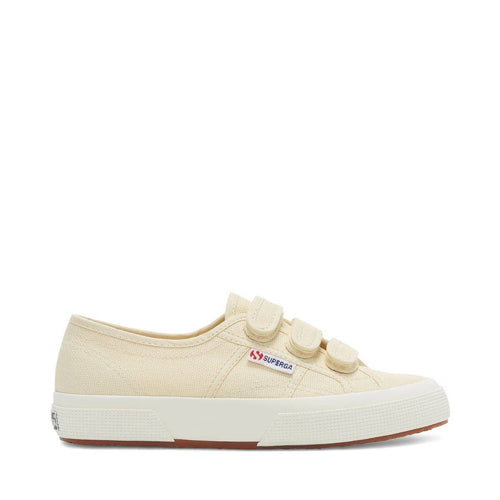Light beige canvas sneakers with hook-and-loop straps and white rubber sole