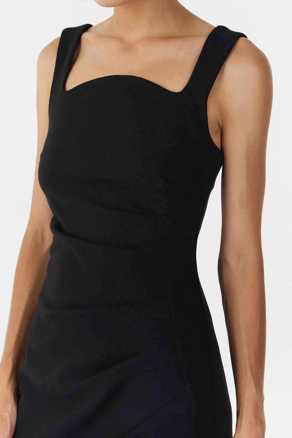 Black sleeveless square-neck tuck dress with thick straps and fitted bodice