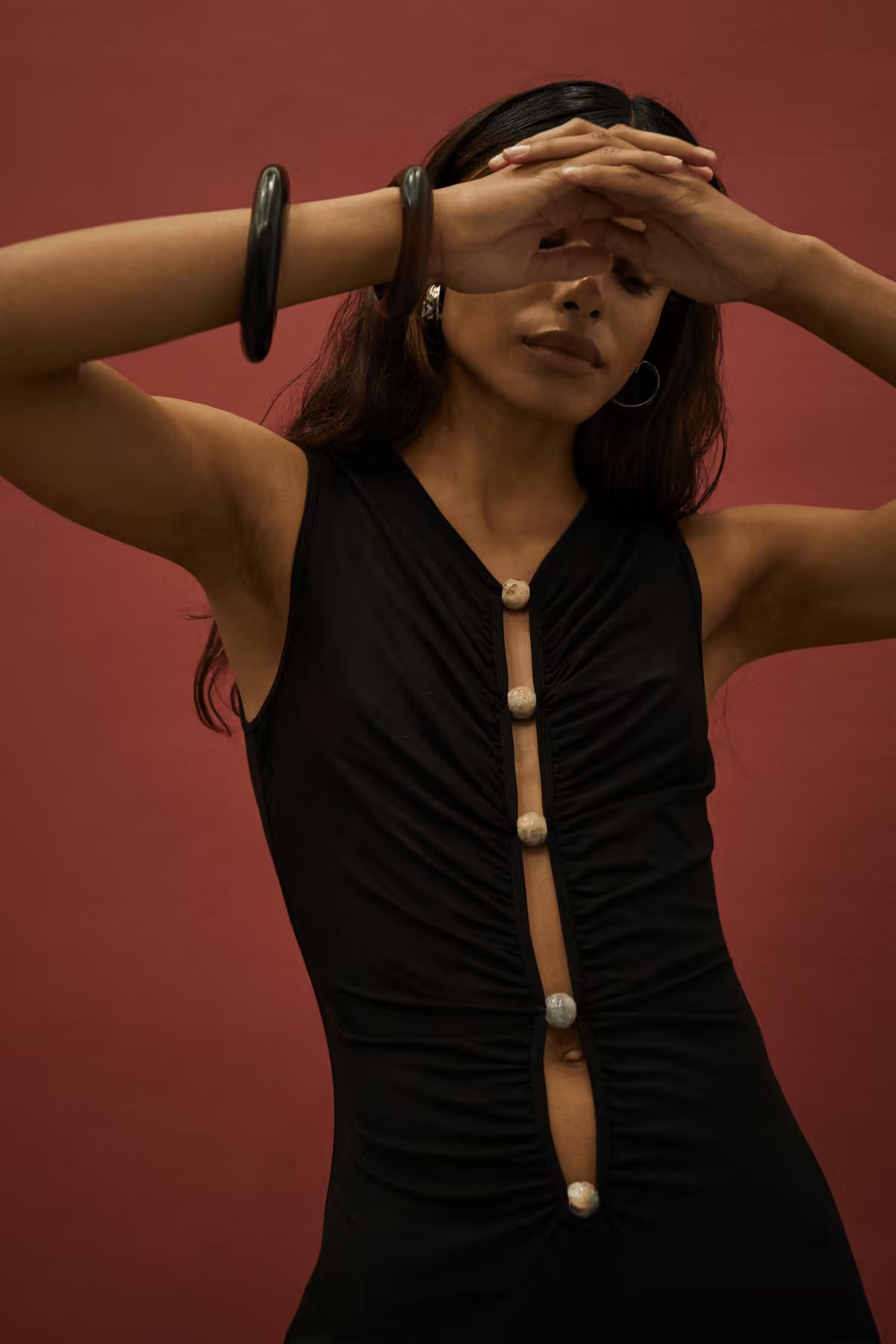 Black tank maxi dress with V-neck, sleeveless cut, and button-front ruching