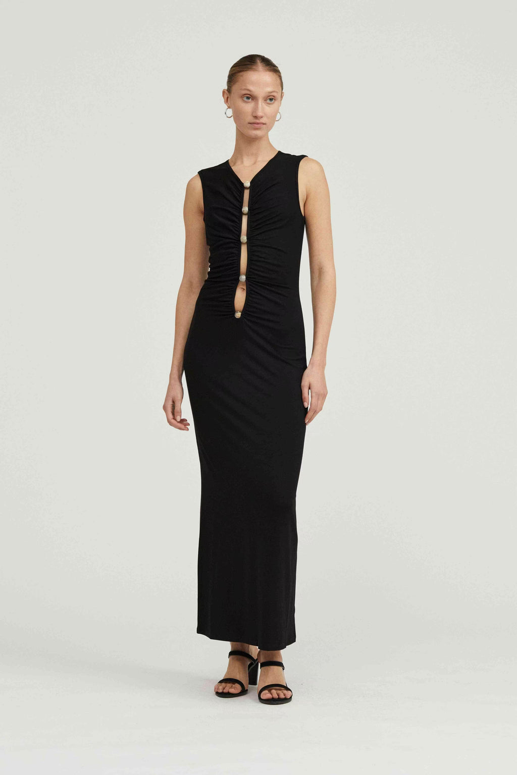 Black sleeveless maxi dress with V-neck and centered button-front placket