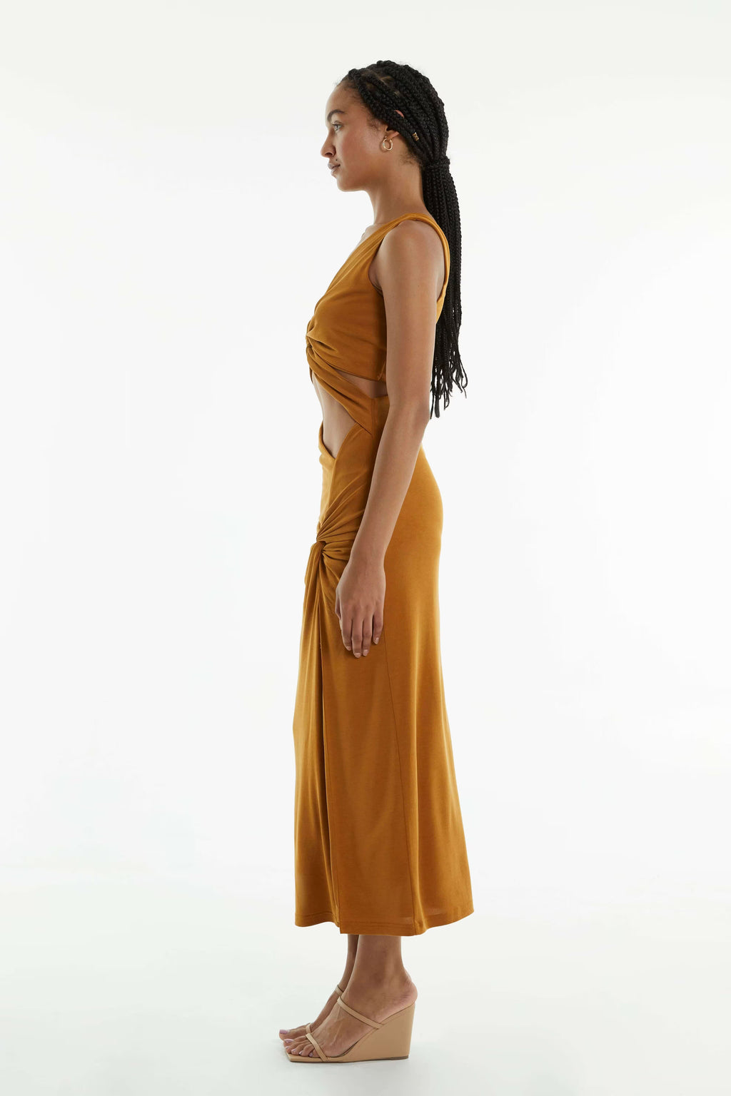 Camel twist-front midi dress side view with halter straps and side slit