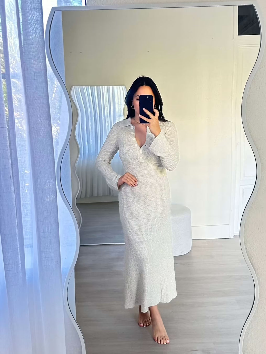 Cream knit shirt dress with long sleeves, button front and collar, fitted waist