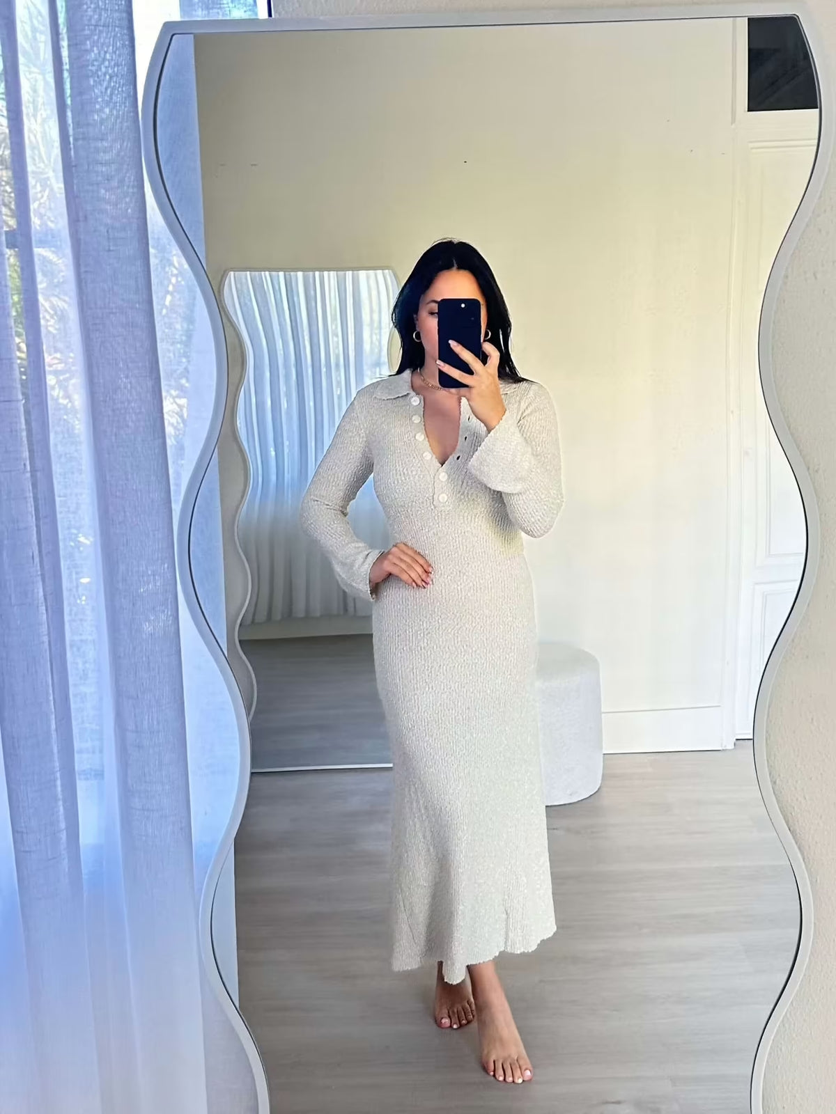 Cream knit shirt dress with long sleeves, button front and collar, fitted waist