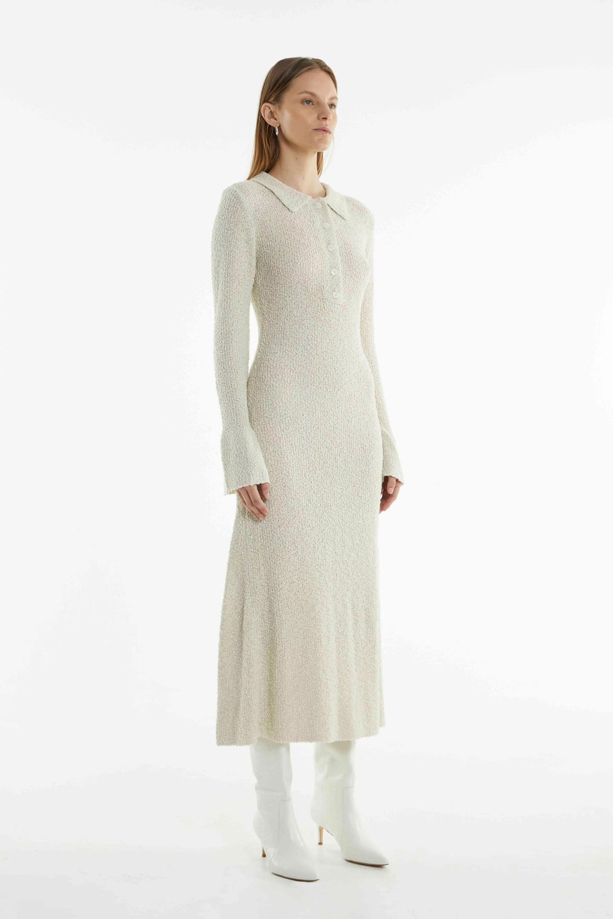 Cream knit shirt dress with long sleeves, button-front collar, straight midi hem