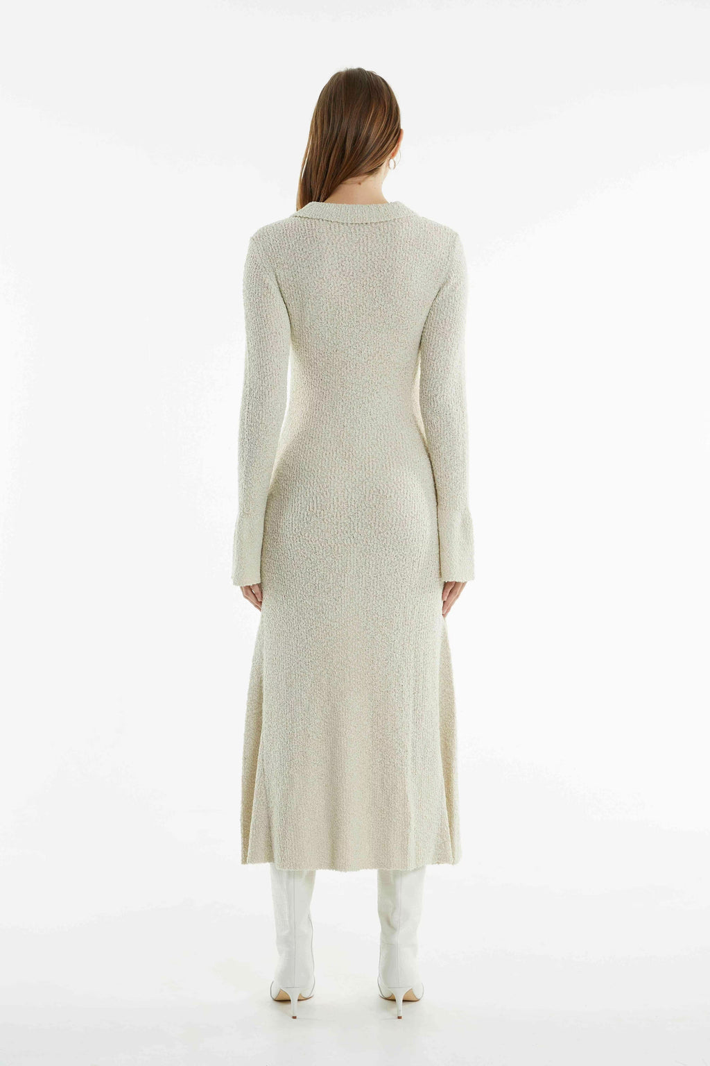 Cream knit shirt dress back view with long sleeves and midi-length hem, slight flare