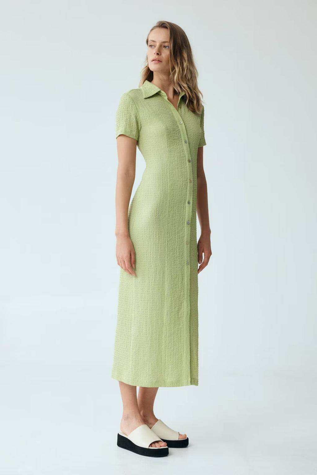 Mint waffle midi shirt dress with button front and short sleeves, worn to the side