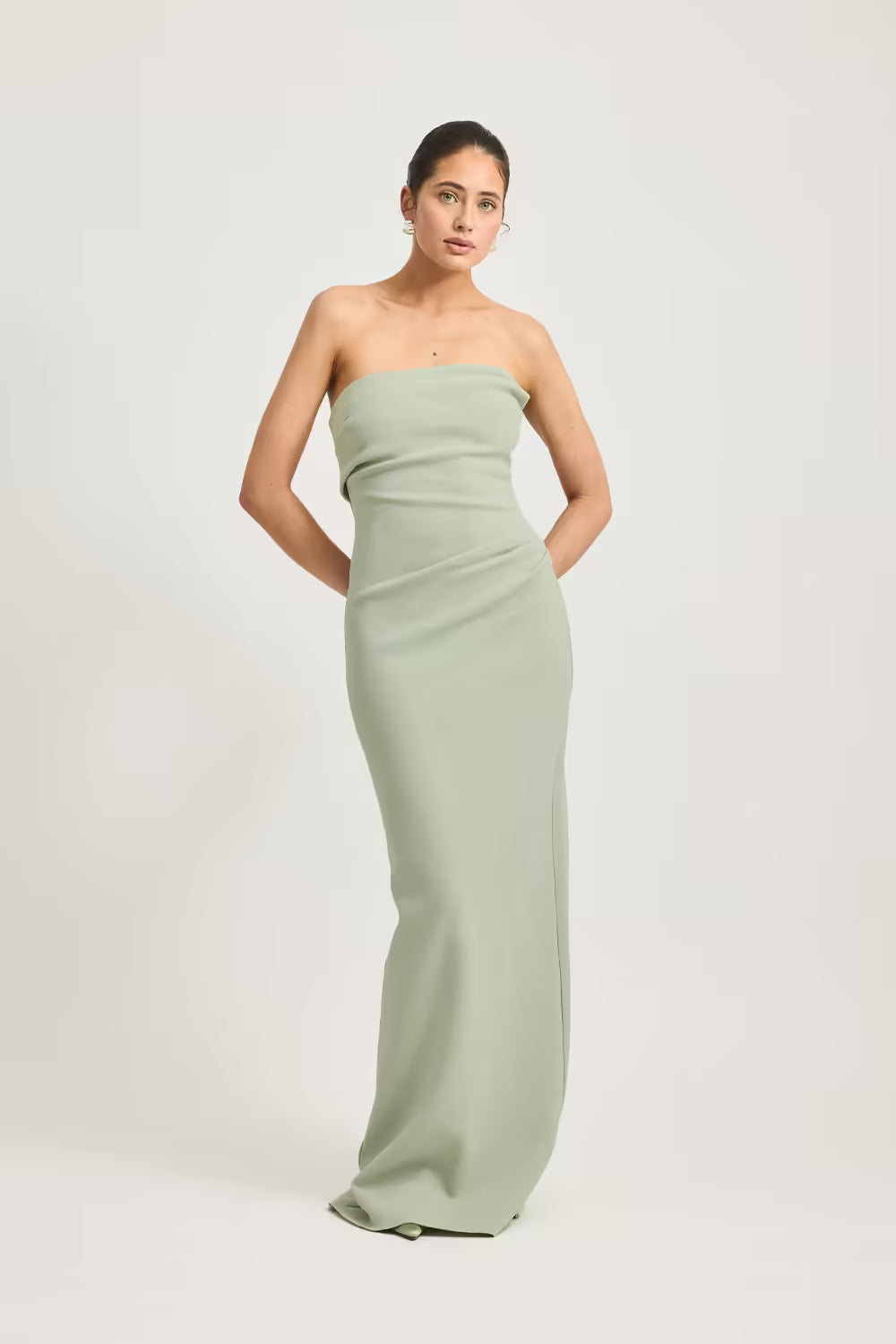Sage green strapless column dress with gathered bust detail