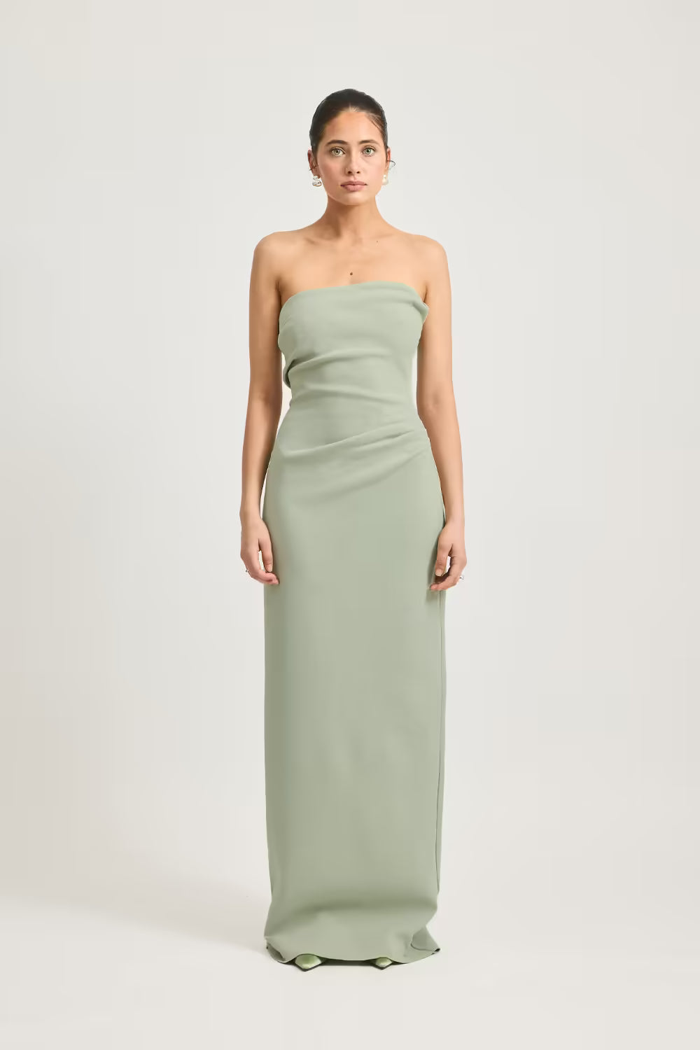 Sage green strapless maxi dress with straight neckline and fitted silhouette