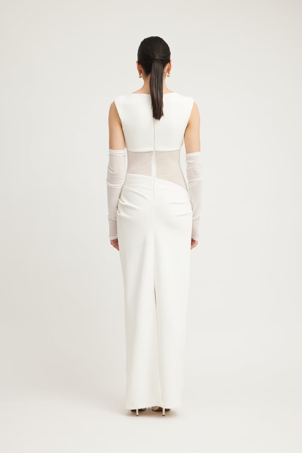 Ivory sleeveless dress with draped back yoke and long column silhouette
