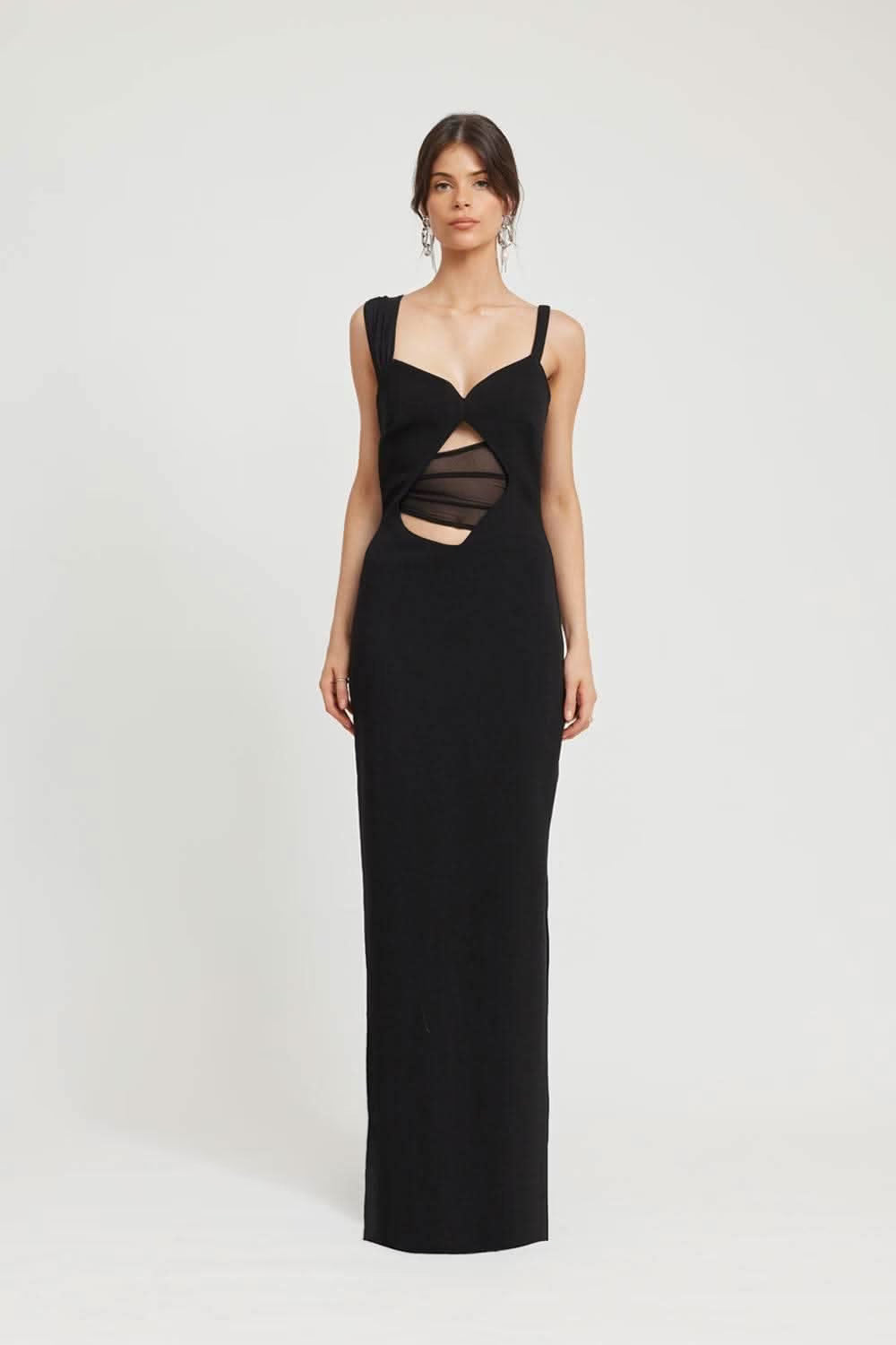 Black long dress with V-neckline, spaghetti straps, and waist cutout design