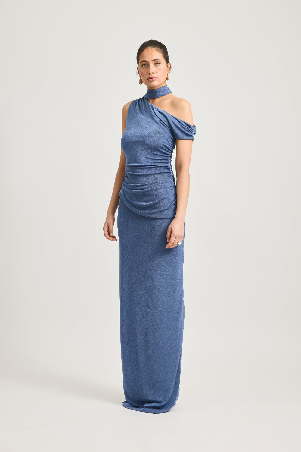 Sleeveless one-shoulder maxi dress in blue with draped neckline and ruched waist