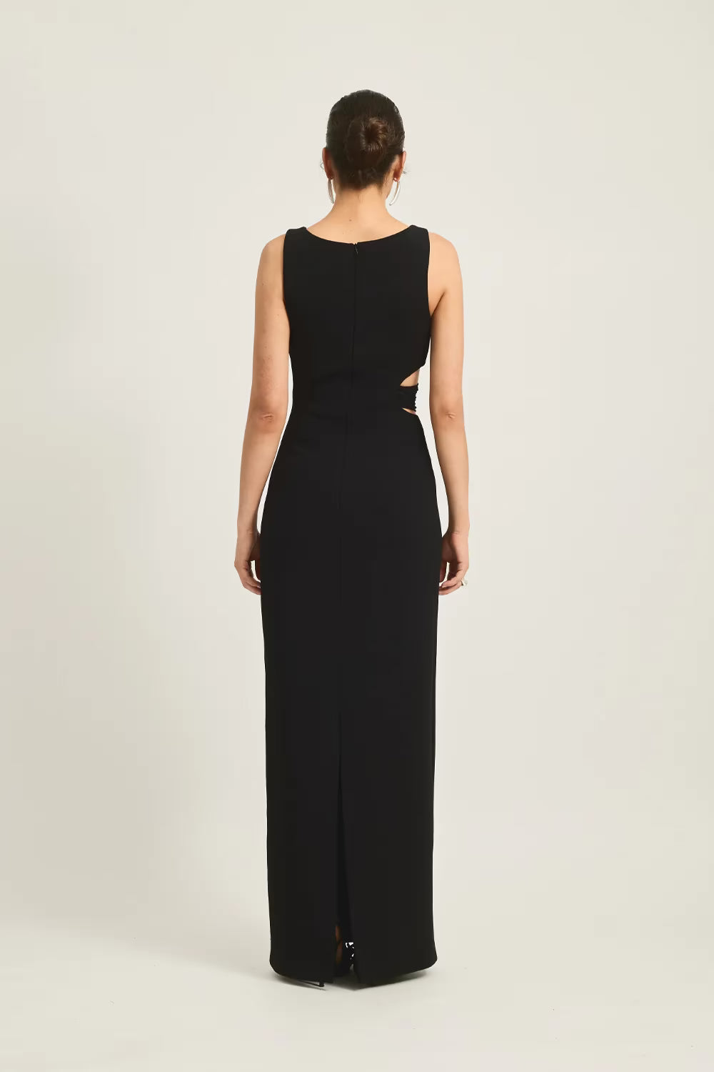Black sleeveless maxi dress, back view with fitted long silhouette