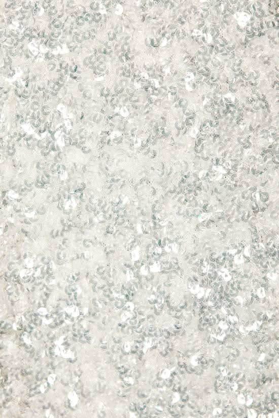 White speckled wrap shirt fabric with textured, lightly sparkly surface.