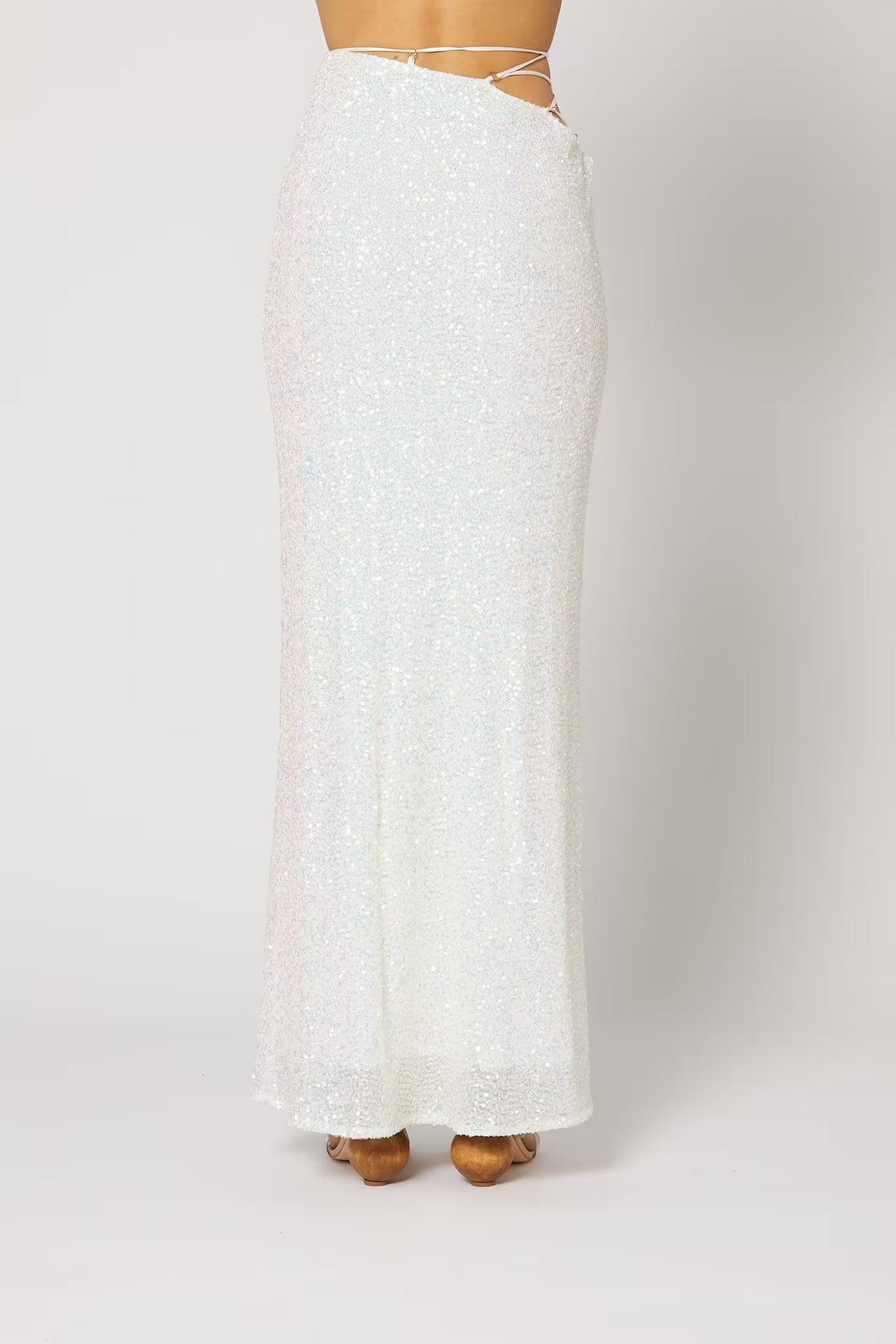 Cristobal sequin maxi skirt in white, hem detail with fitted waist and flared length