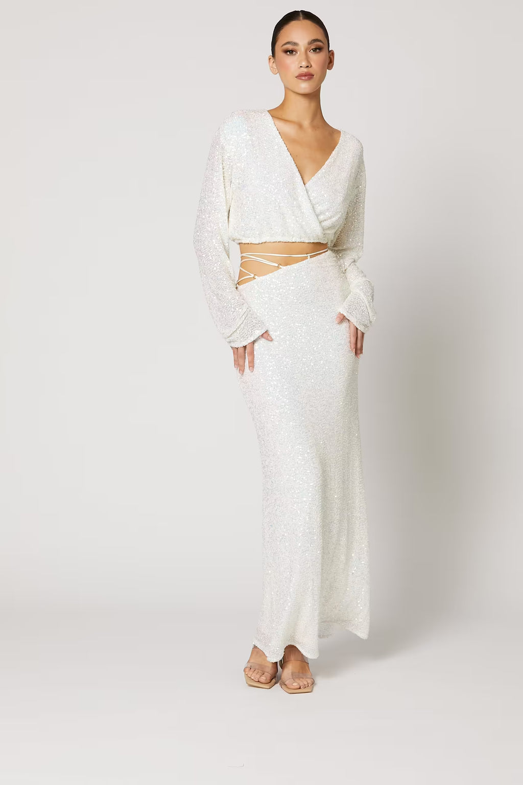 Sequin skirt with high waist and long, fitted silhouette in light silver-white