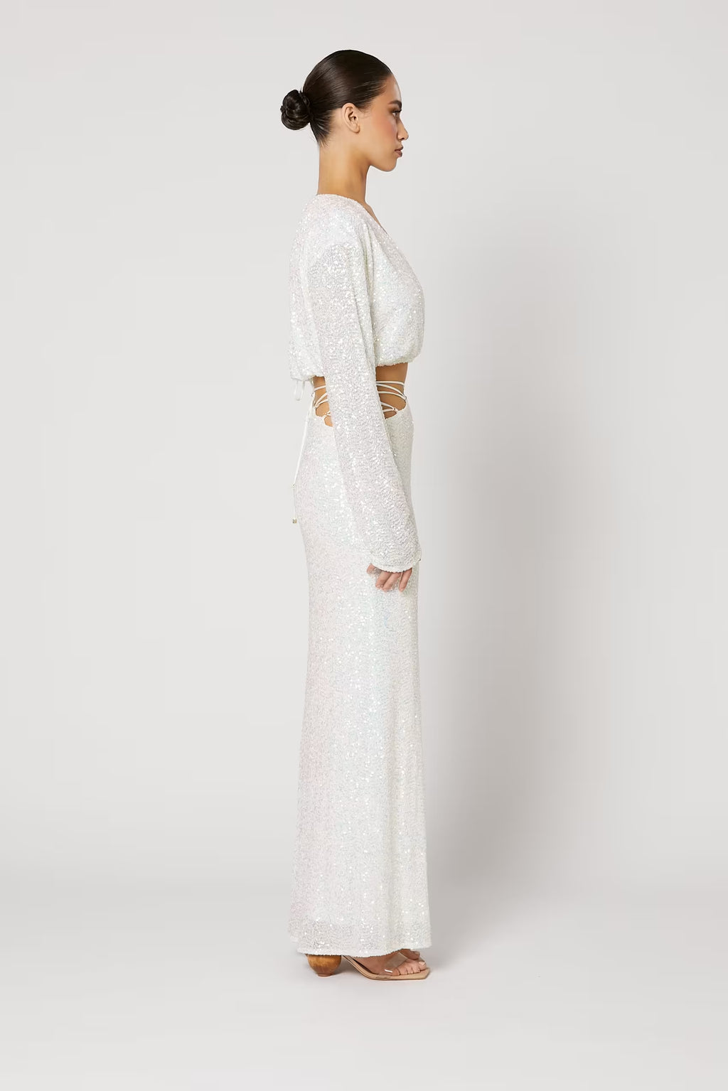 Long back view sequin skirt with allover sparkle finish and high-waist fit