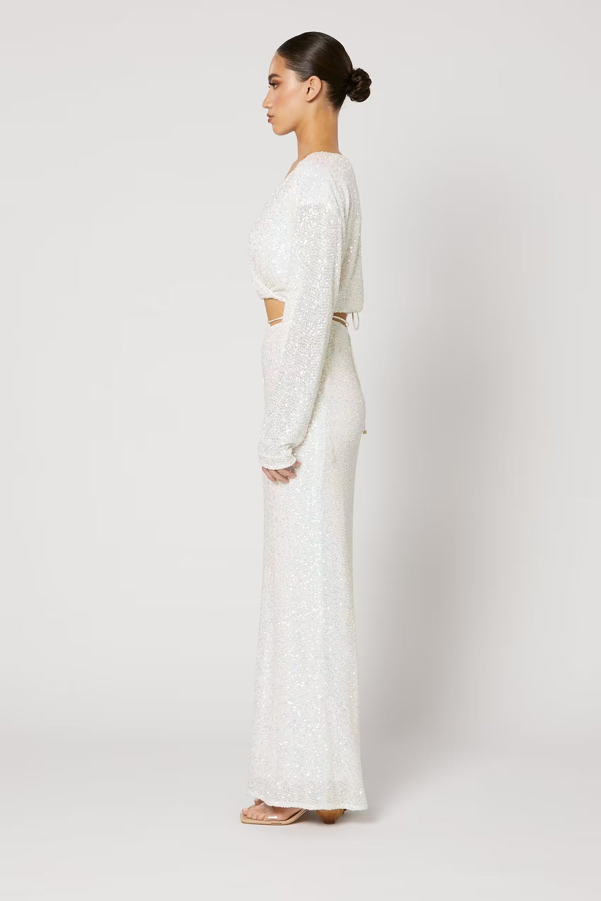 Long sequin skirt in light silver-white with slim side profile and high-waist styling