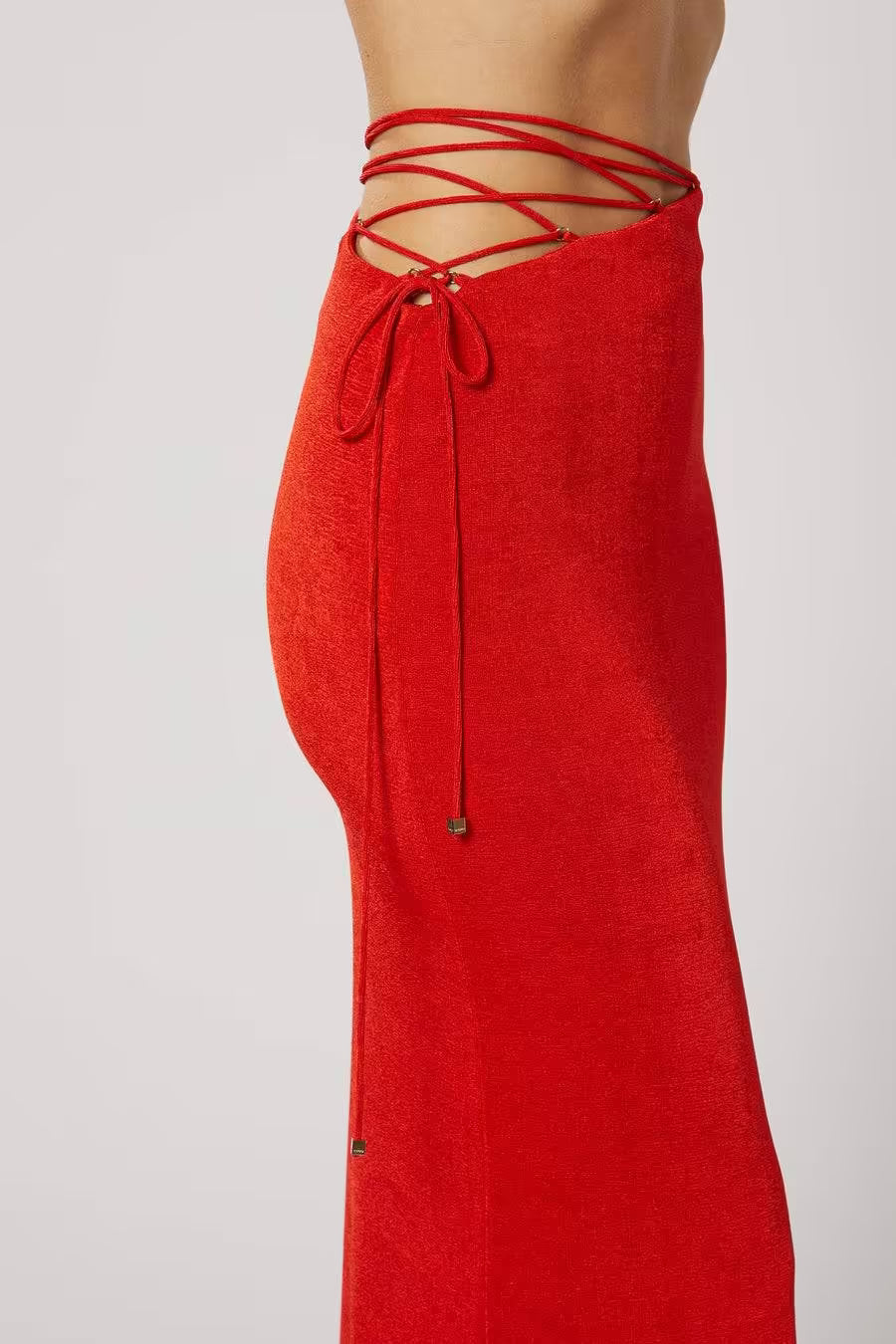 Red maxi skirt with lace-up wrap waistband and drawstring ties at the front