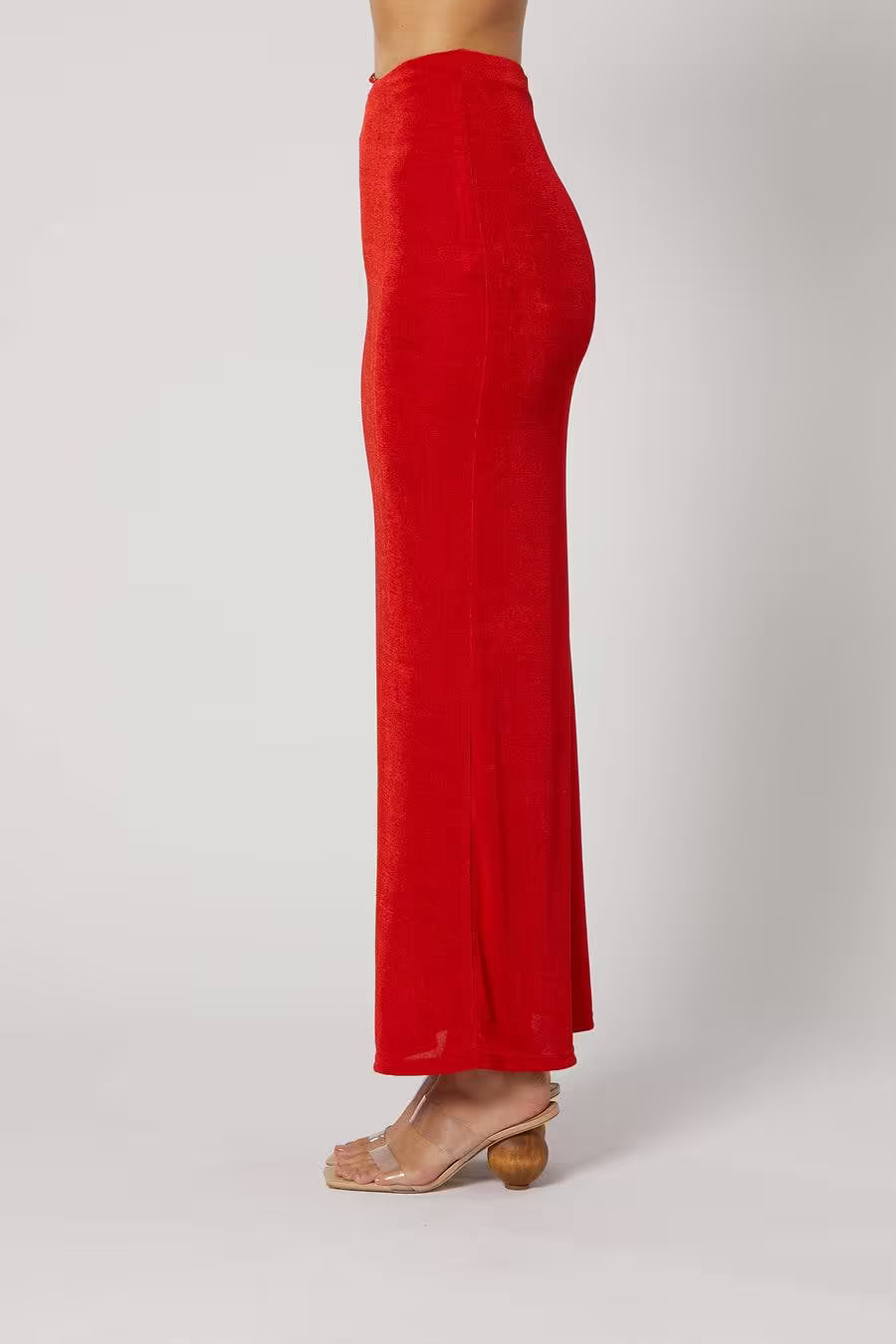Red maxi skirt with side seam shape and ankle-length straight silhouette