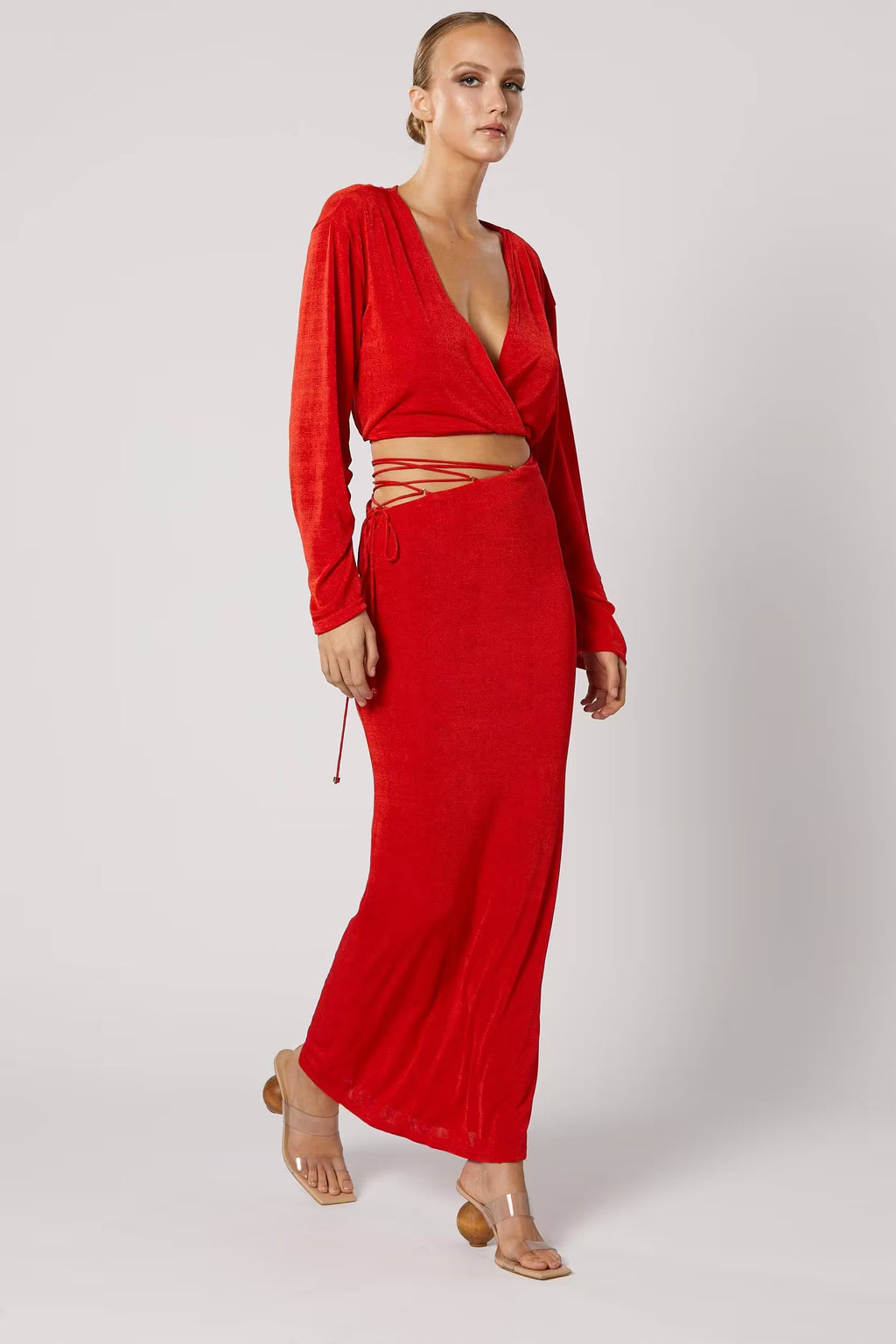 Red maxi skirt with V-cut front and lace-up waist ties