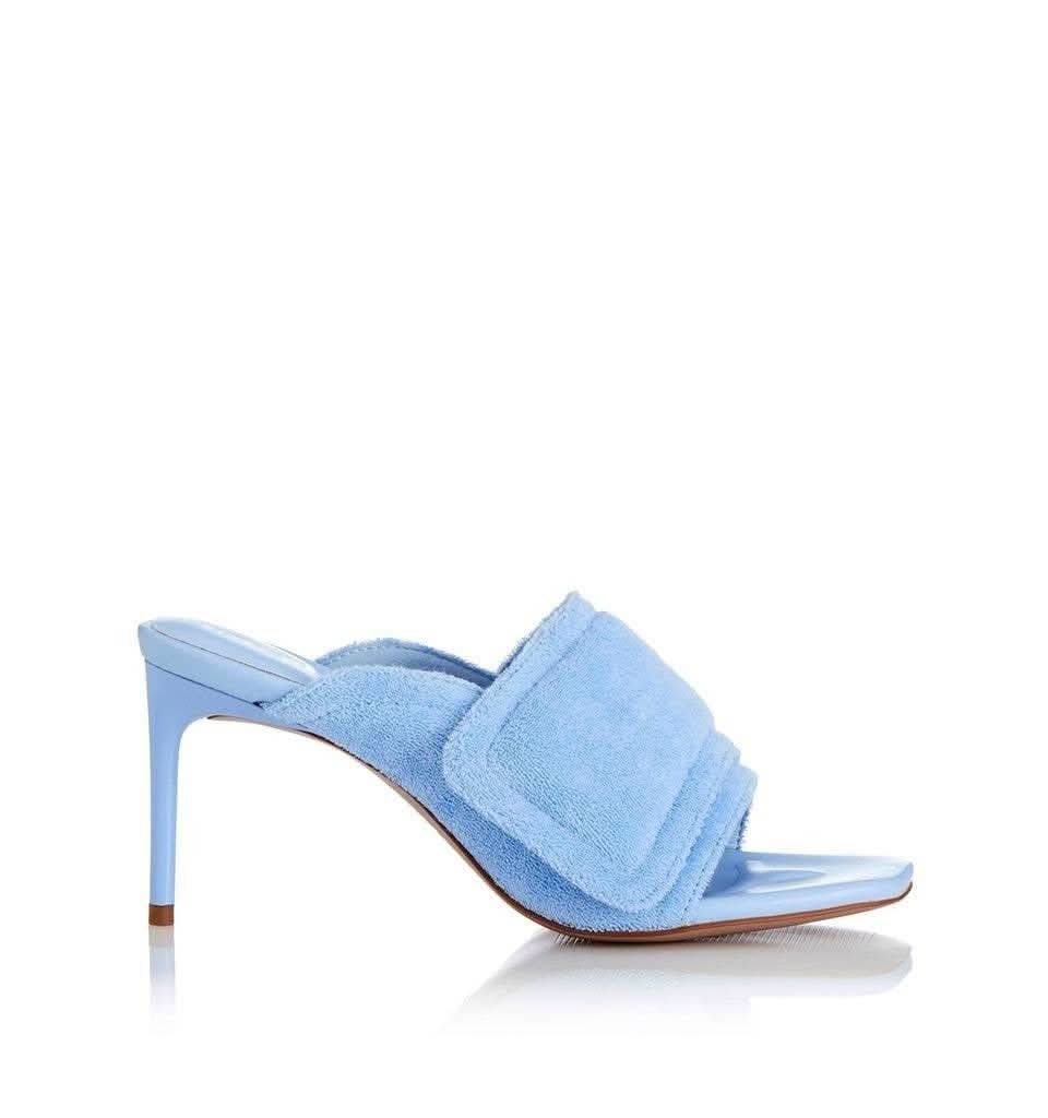 Pale blue terry slide heeled mule sandal with wide wrapped strap and slim stiletto heel