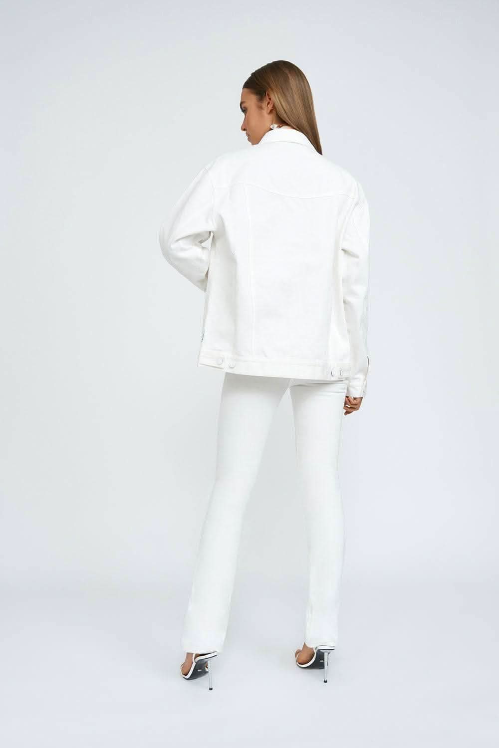White denim jacket back view with button placket and shoulder yoke